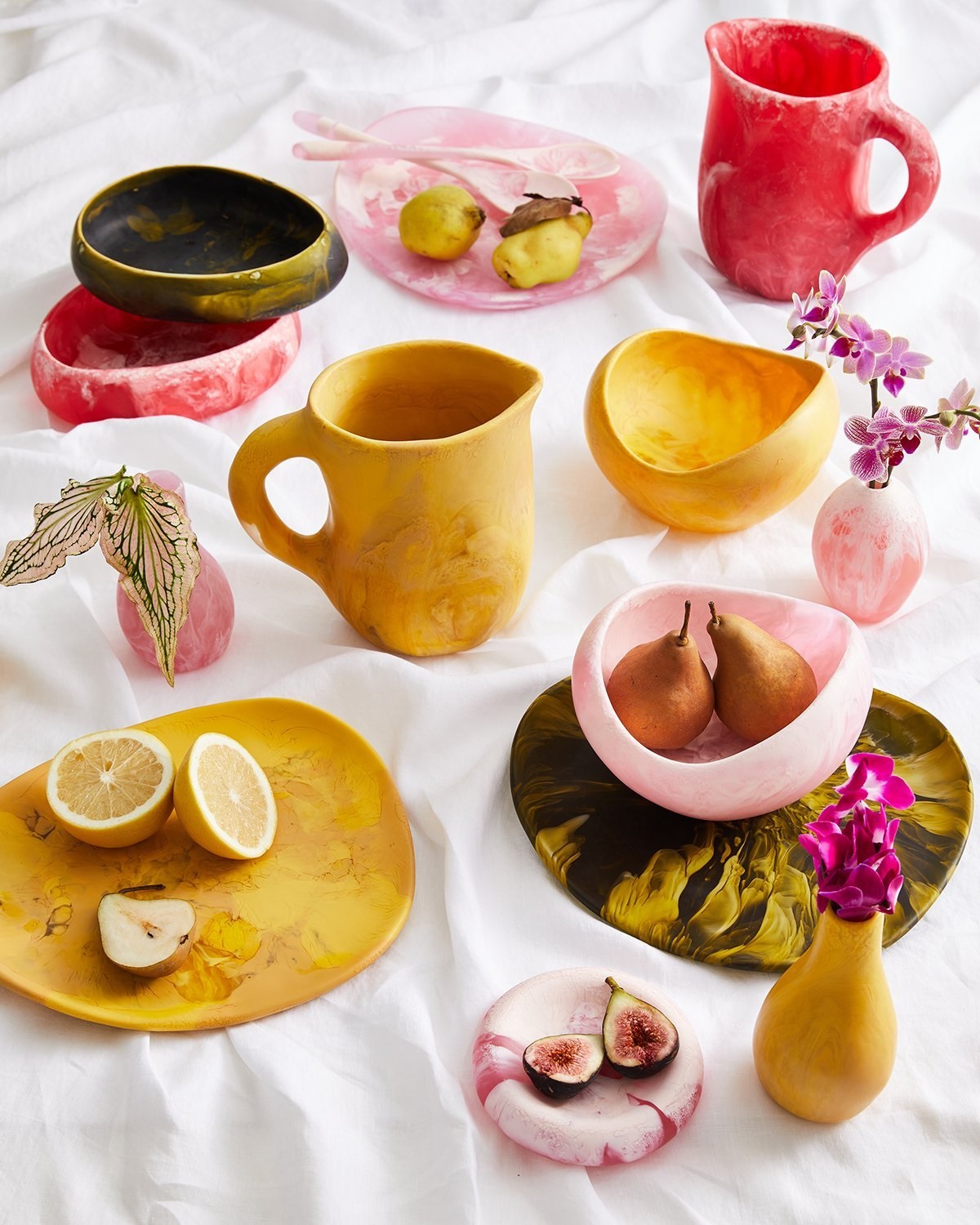 table with resin dinnerware collection