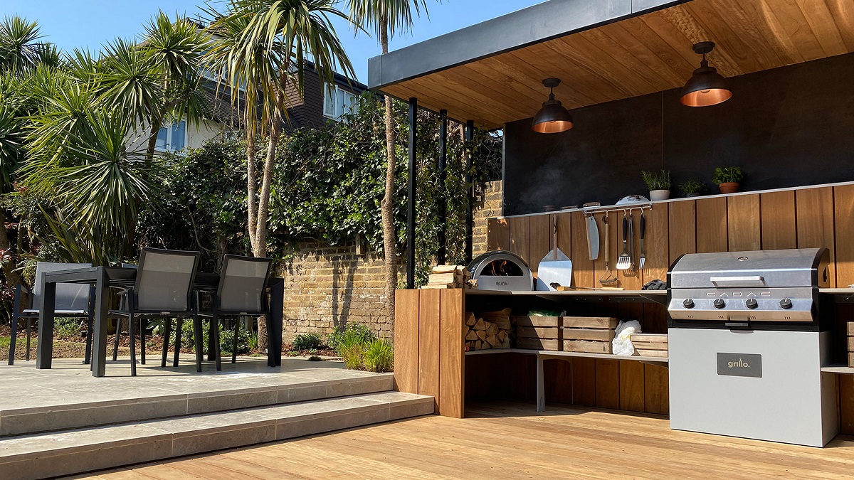 outdoor area with kitchen and table